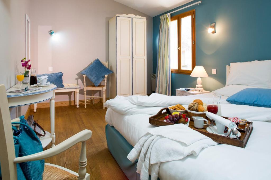 Logis Hotel Les Flots Bleus Больё-сюр-Дордонь Номер фото